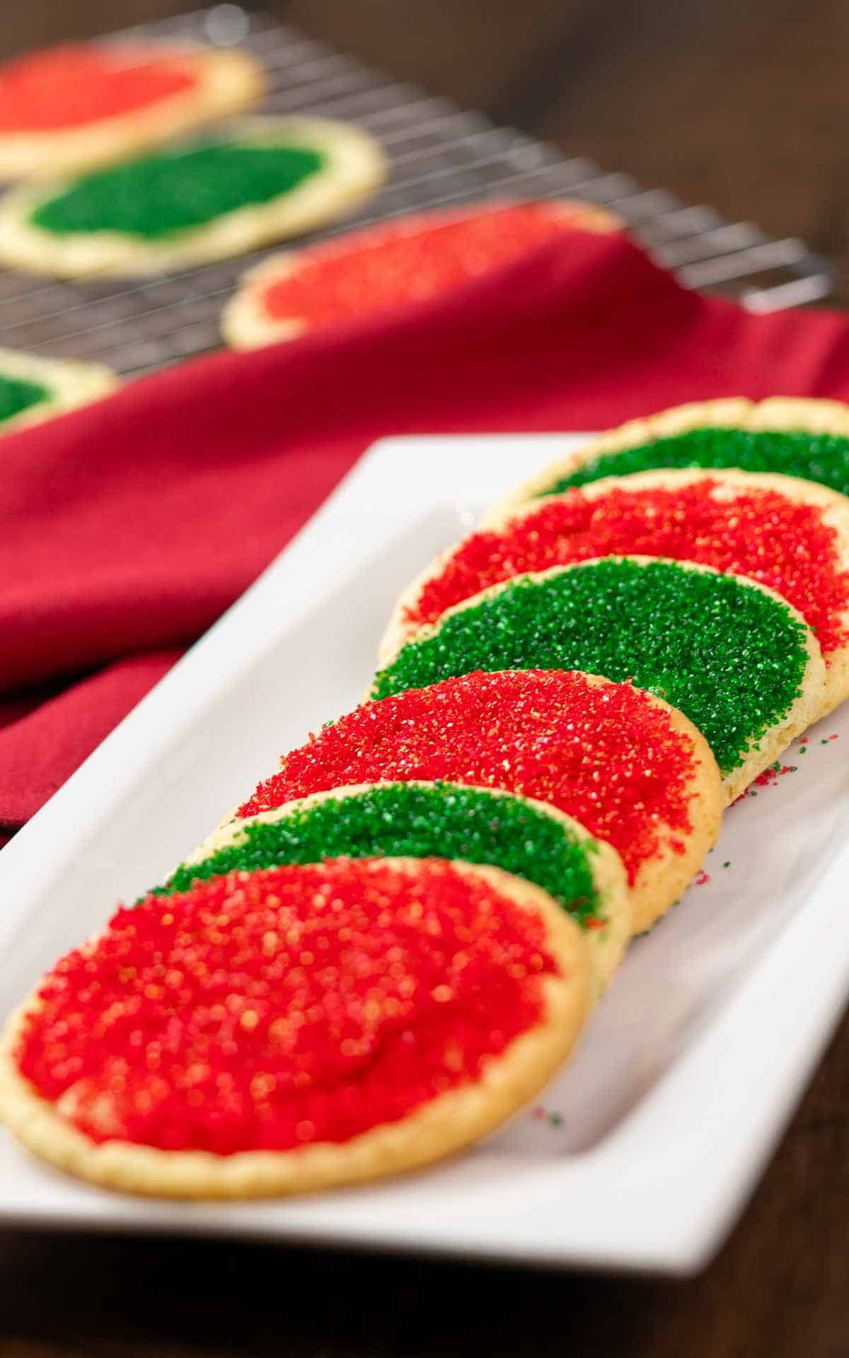A rectangular dish with cut out sugar cookies.