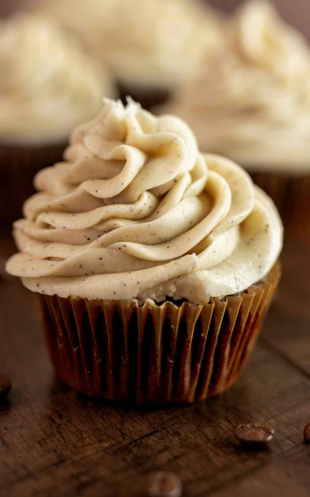 Espresso buttercream frosting topping espresso chocolate cupcakes.