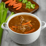 Instant Pot Beef Stew with celery stalks and baby carrots
