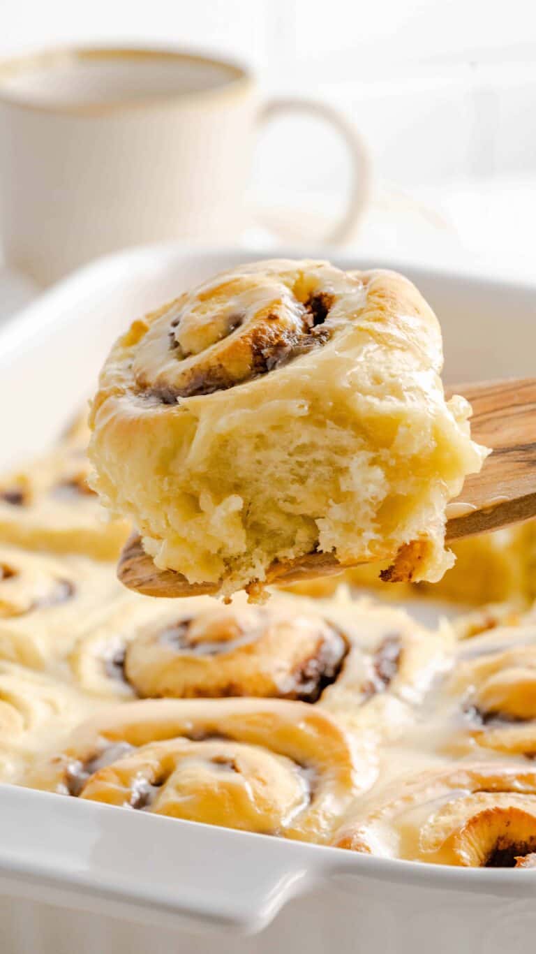 These gooey homemade cinnamon rolls are made from scratch and with real maple syrup. Topping these cinnamon buns is a creamy and smooth maple flavored icing.