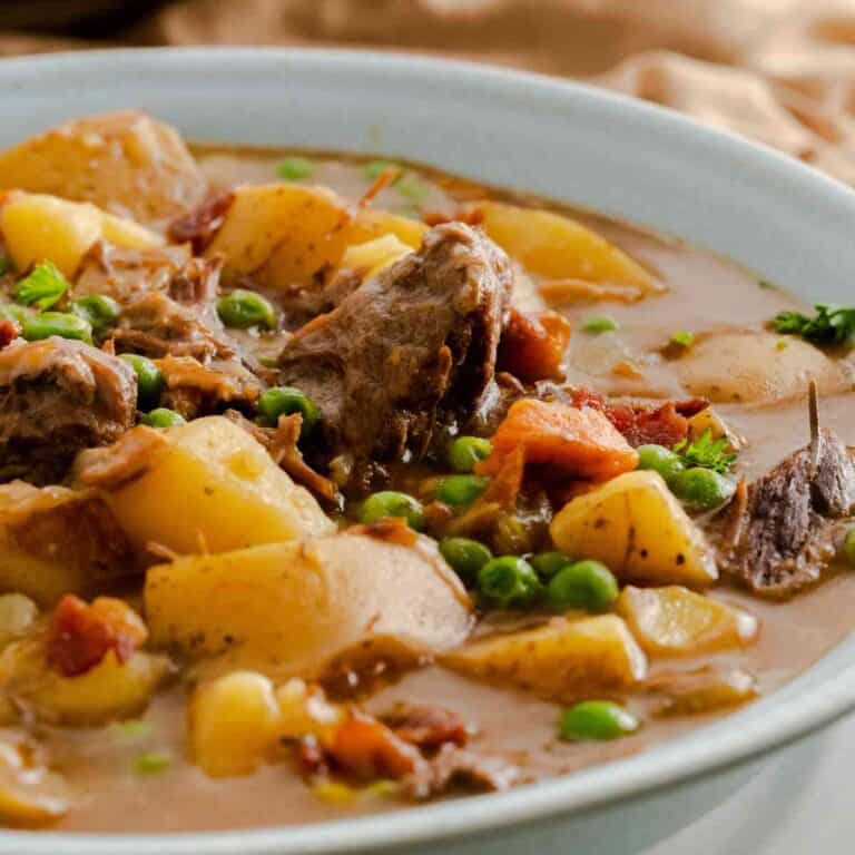 A bowl filled to the brim with Instant Pot Beef Stew.