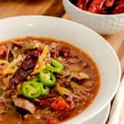 White bowl filled with Instant Pot Spicy Venison Chili