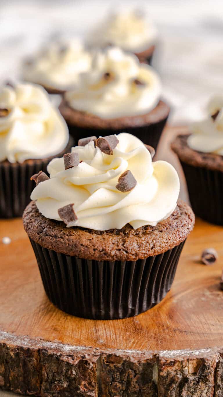 irish cream cupcakes on wood serving board