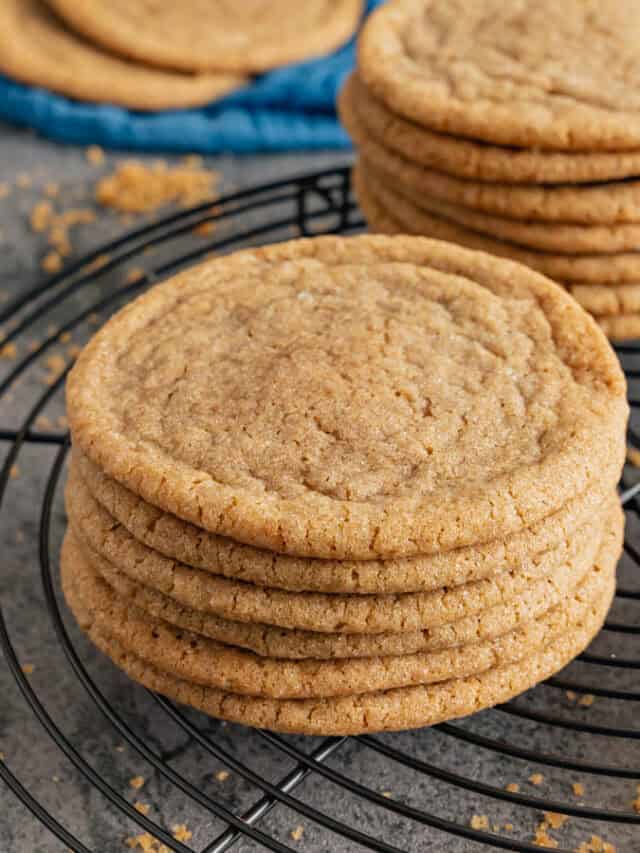 A small stack of brown sugar cookies on wire rack.