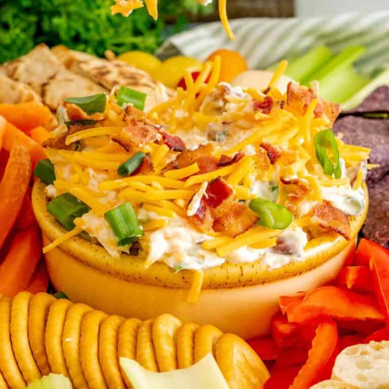 A serving bowl full of million dollar dip featured image