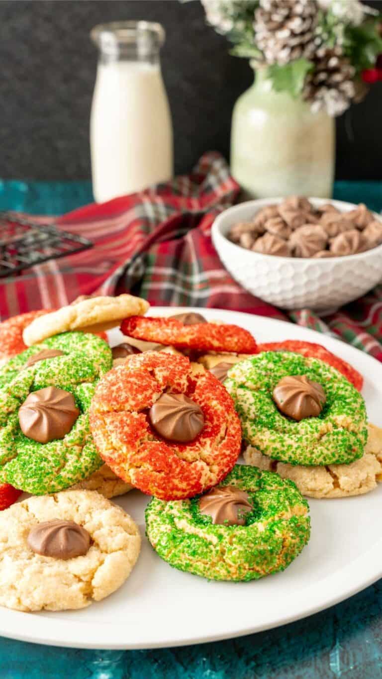 Christmas kiss cookies decorated with red and green sanding sugar.
