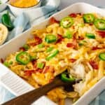 Instant Pot Jalapeno Popper Chicken Pasta in a casserole dish that has been placed under the broiler.