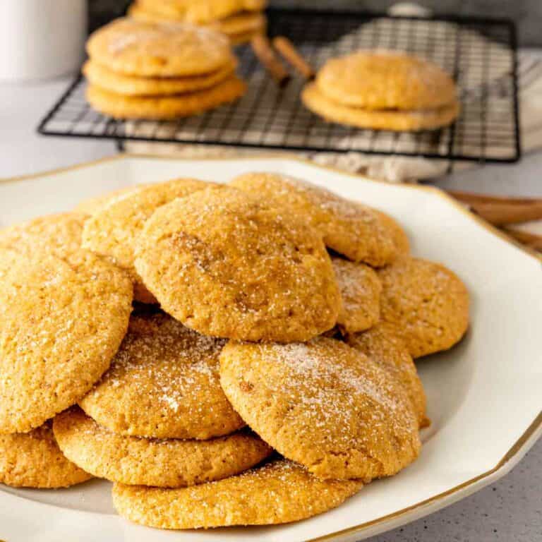 Soft and tender pumpkin sugar cookies rolled in cinnamon sugar.