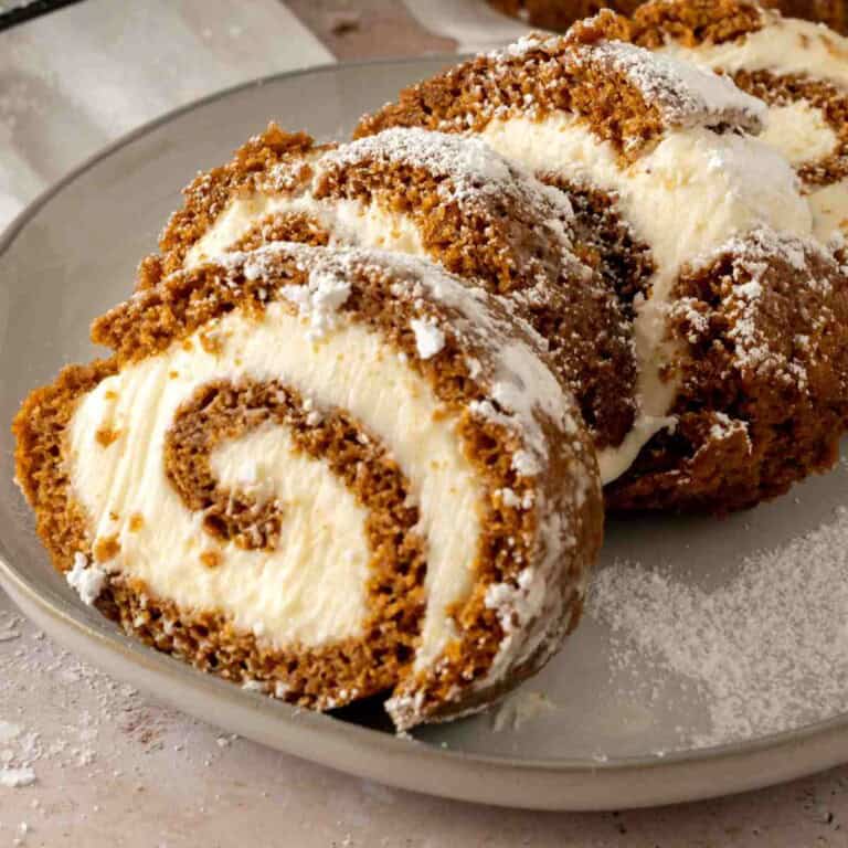 Pumpkin roll sliced featured image.