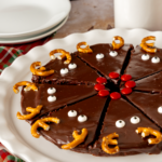 Fudgy Christmas brownies decorated with ganache with reindeer faces.