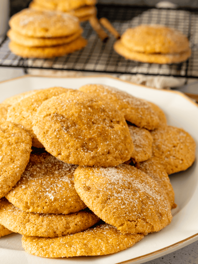 Soft and tender pumpkin sugar cookies rolled in cinnamon sugar.