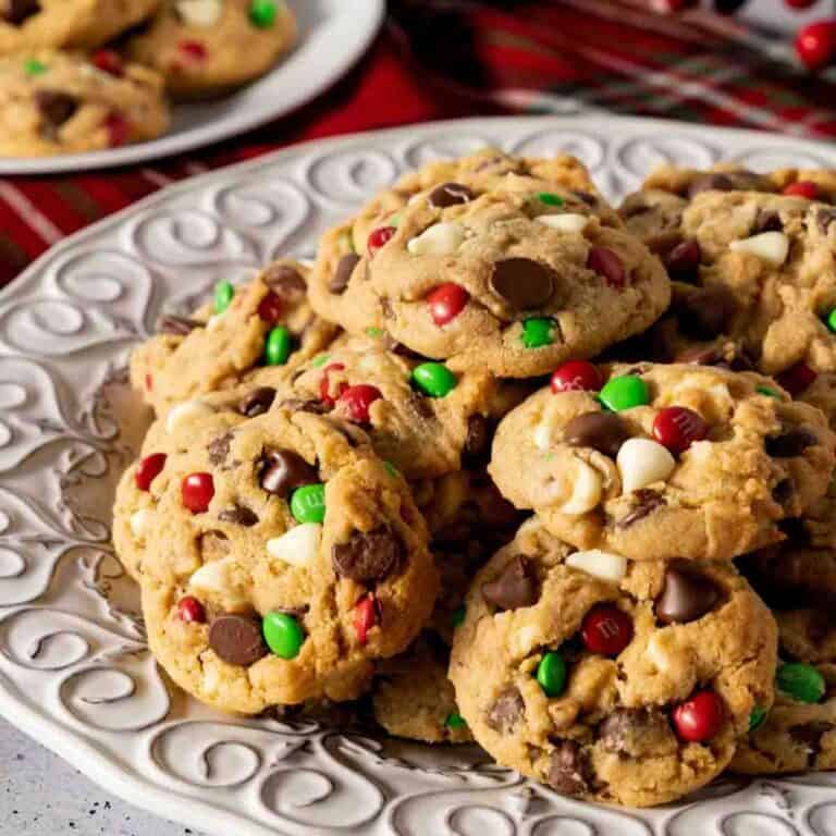 Christmas Cookie Butter Cookies stacked on a decorative plate.