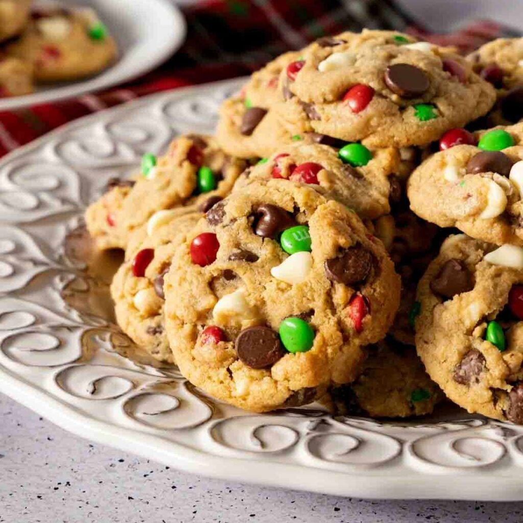 A plate of Christmas Cookie Butter Cookies on a decorative plate.