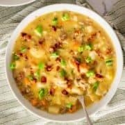 Close up for a bowl of bacon cheeseburger soup made in the crock pot.