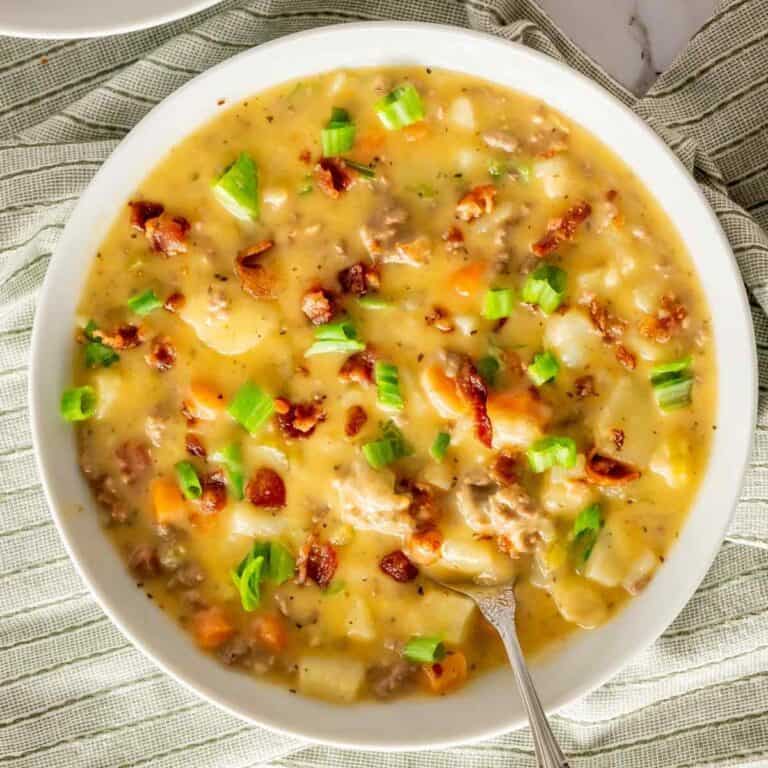 Close up for a bowl of bacon cheeseburger soup made in the crock pot.