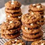 Stacks of chocolate chip cookies made with cocoa powder, white chocolate chips, and semisweet chocolate chips.