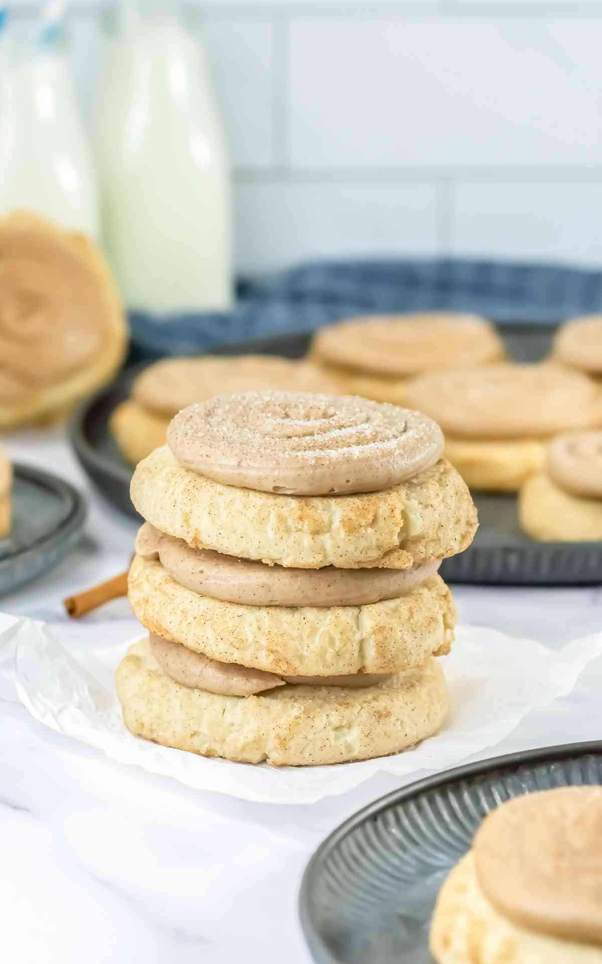 A stack of churro cookies on a piece of parchment.