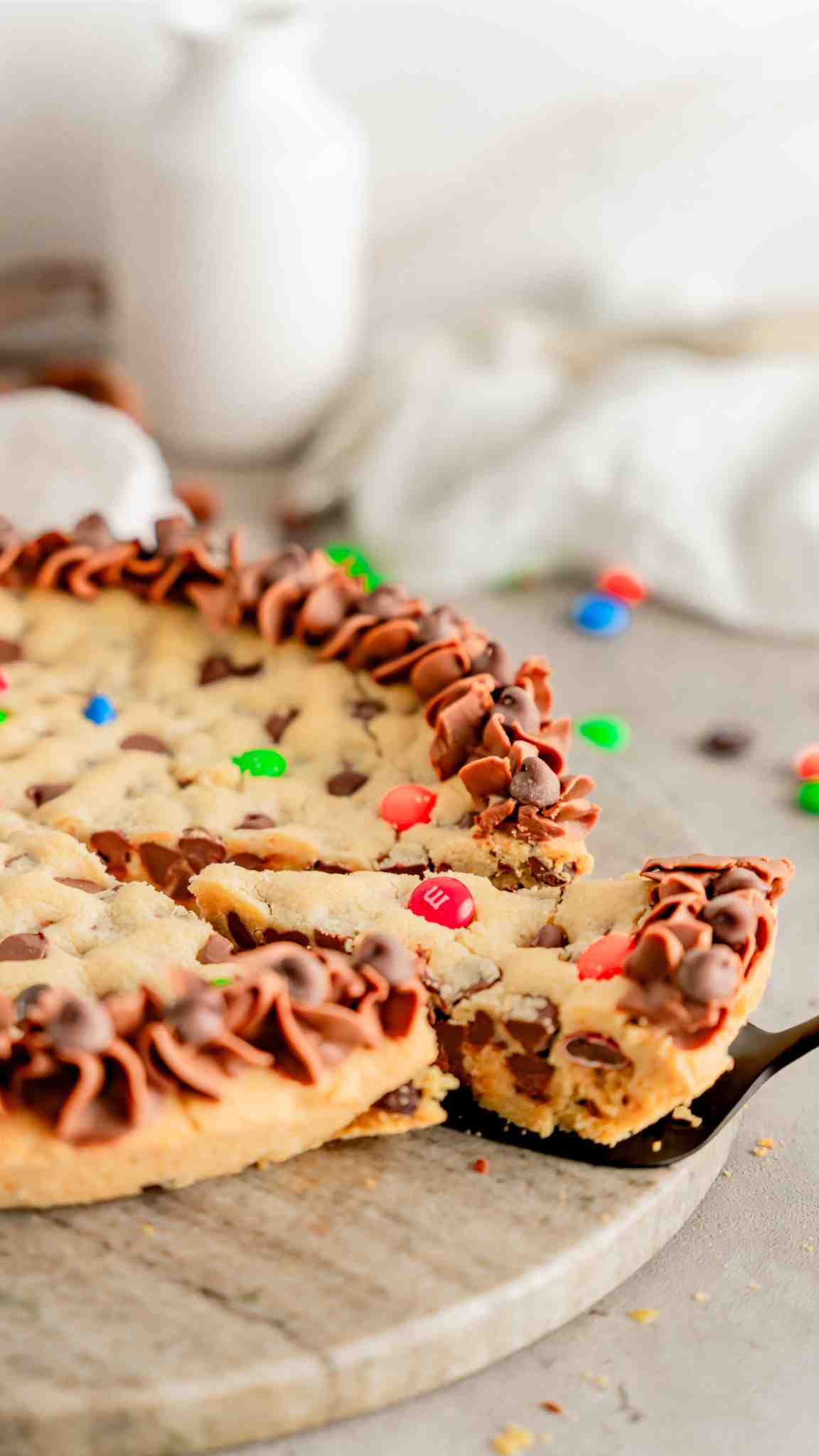 MM Cookie Cake with chocolate chips and chocolate buttercream.