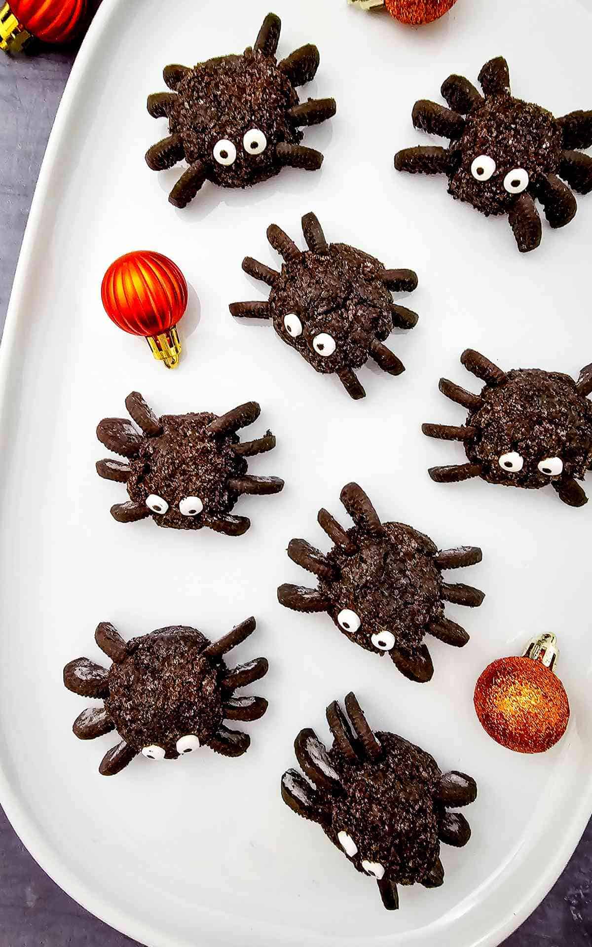 Spider Oreo Truffles on a white plate for Halloween.