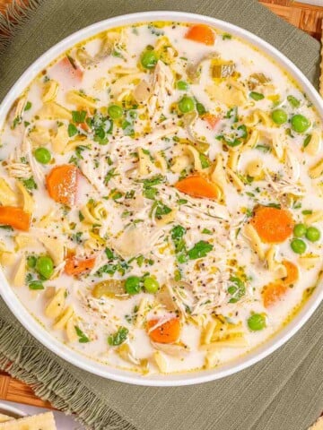 Slow Cooker chicken noodle soup in a bowl featured image.