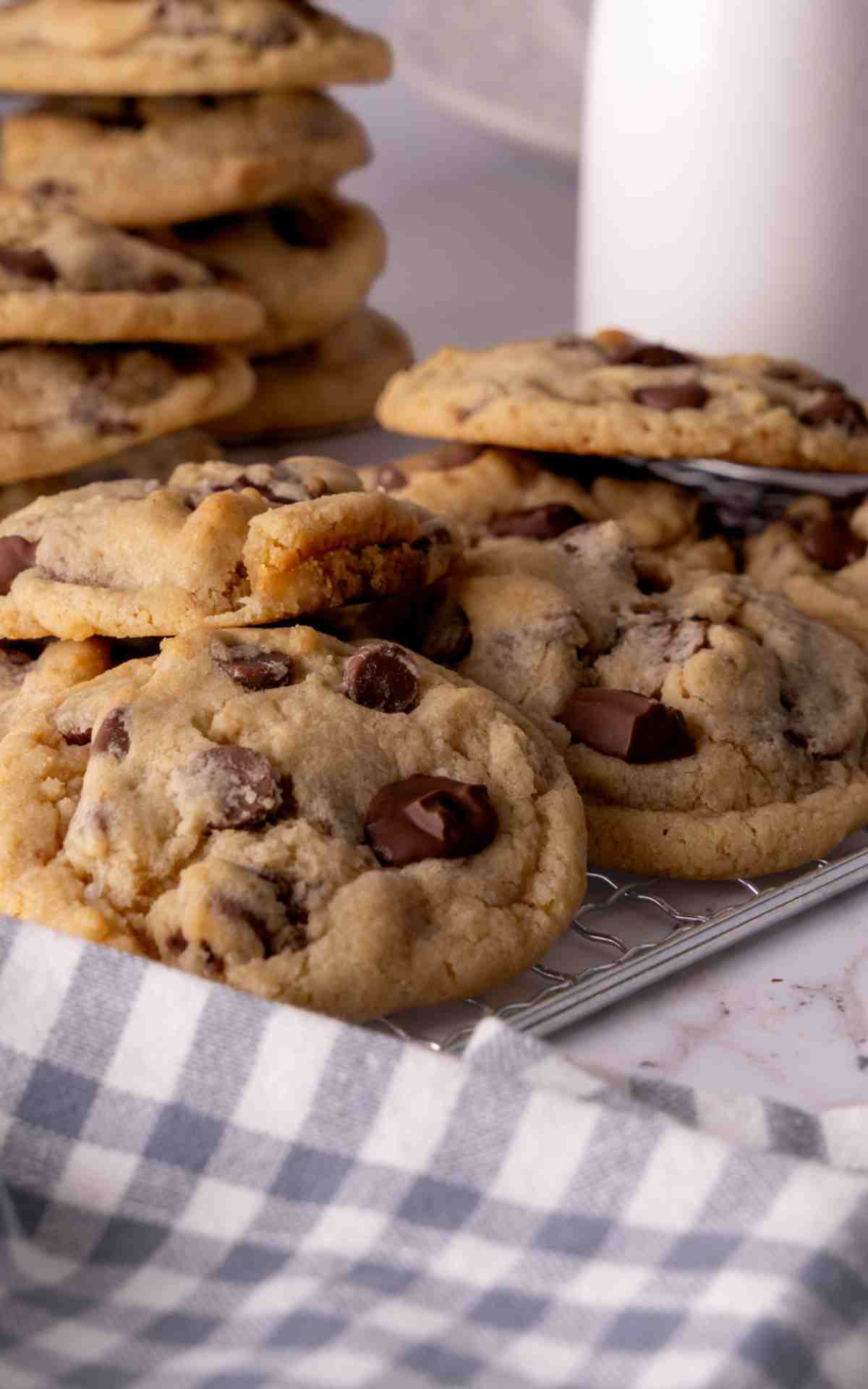 Eggless chocolate chip cookies on a wire rack.