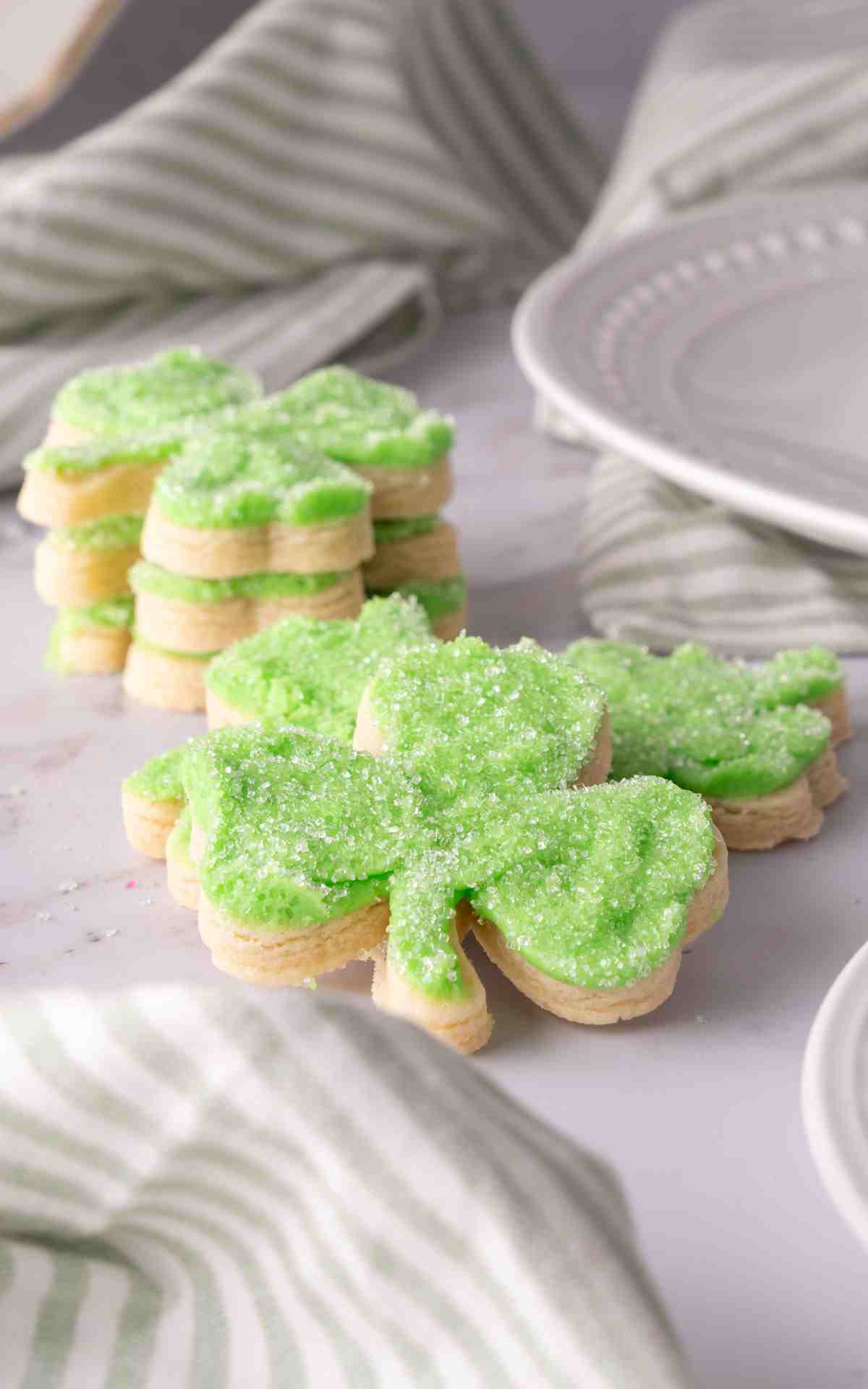 Thick no spread sugar cookies decorated with buttercream and sugar.