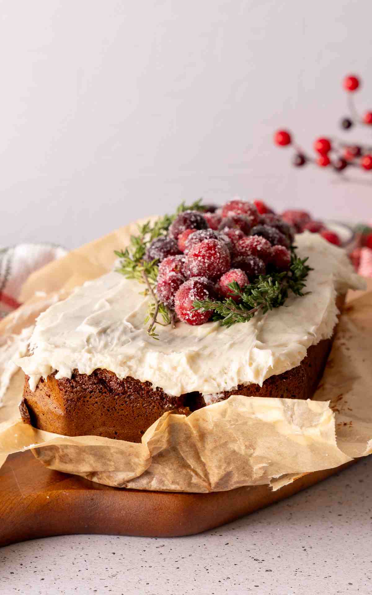 Uncut gingerbread loaf made with cake mix and homemade cream cheese frosting.