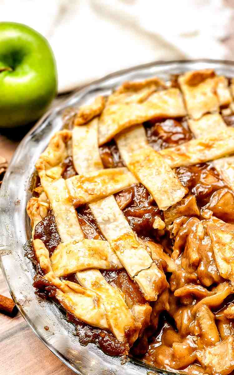Cut into caramel apple pie with lattice top.
