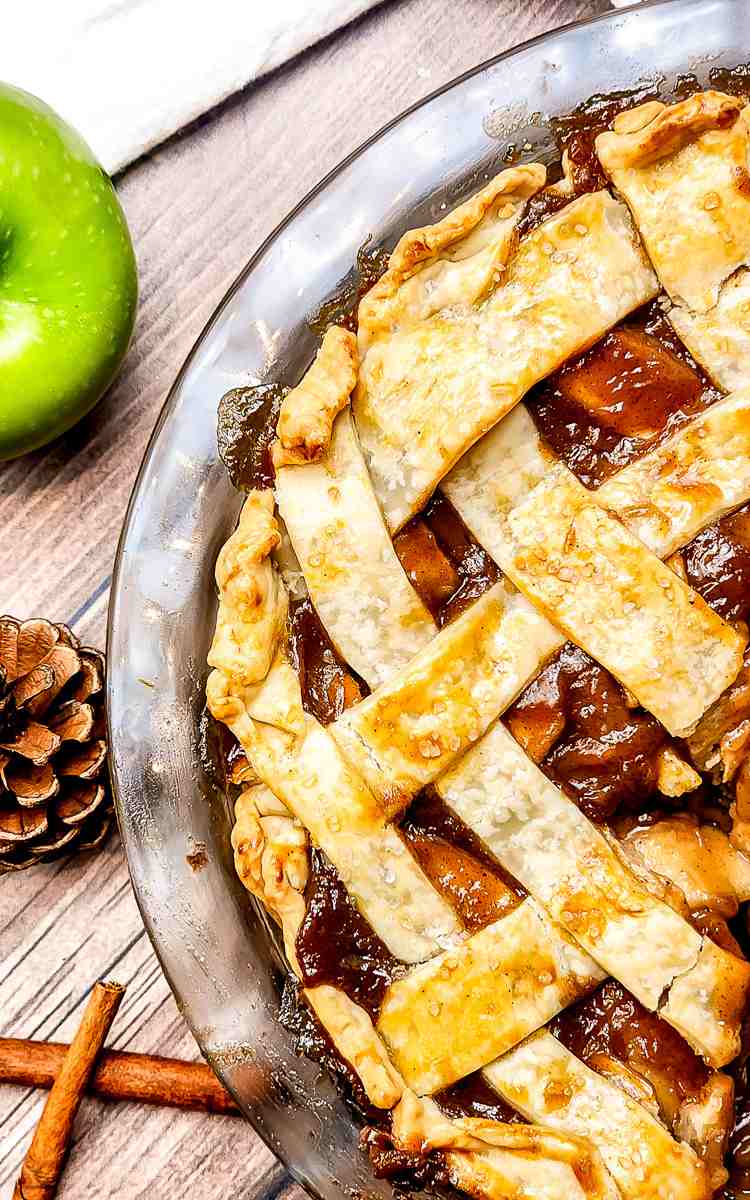 Lattice apple pie with caramel filling.