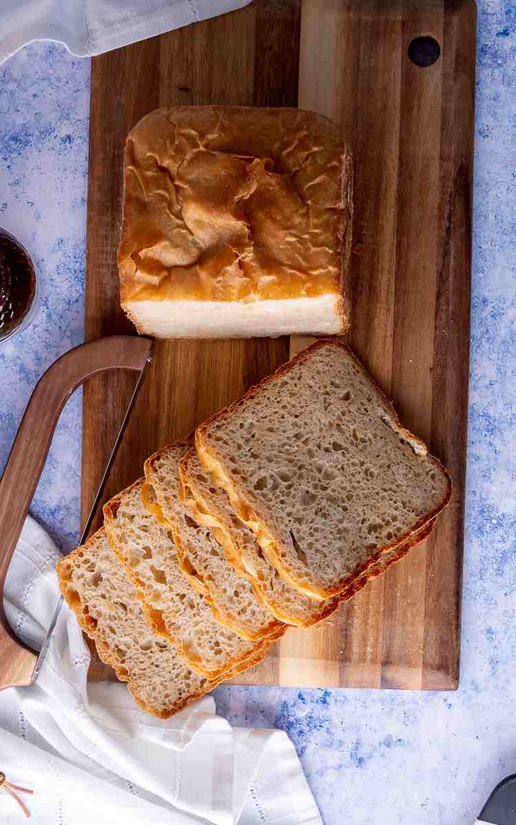 Top view of freshly sliced honey white bread machine recipe.
