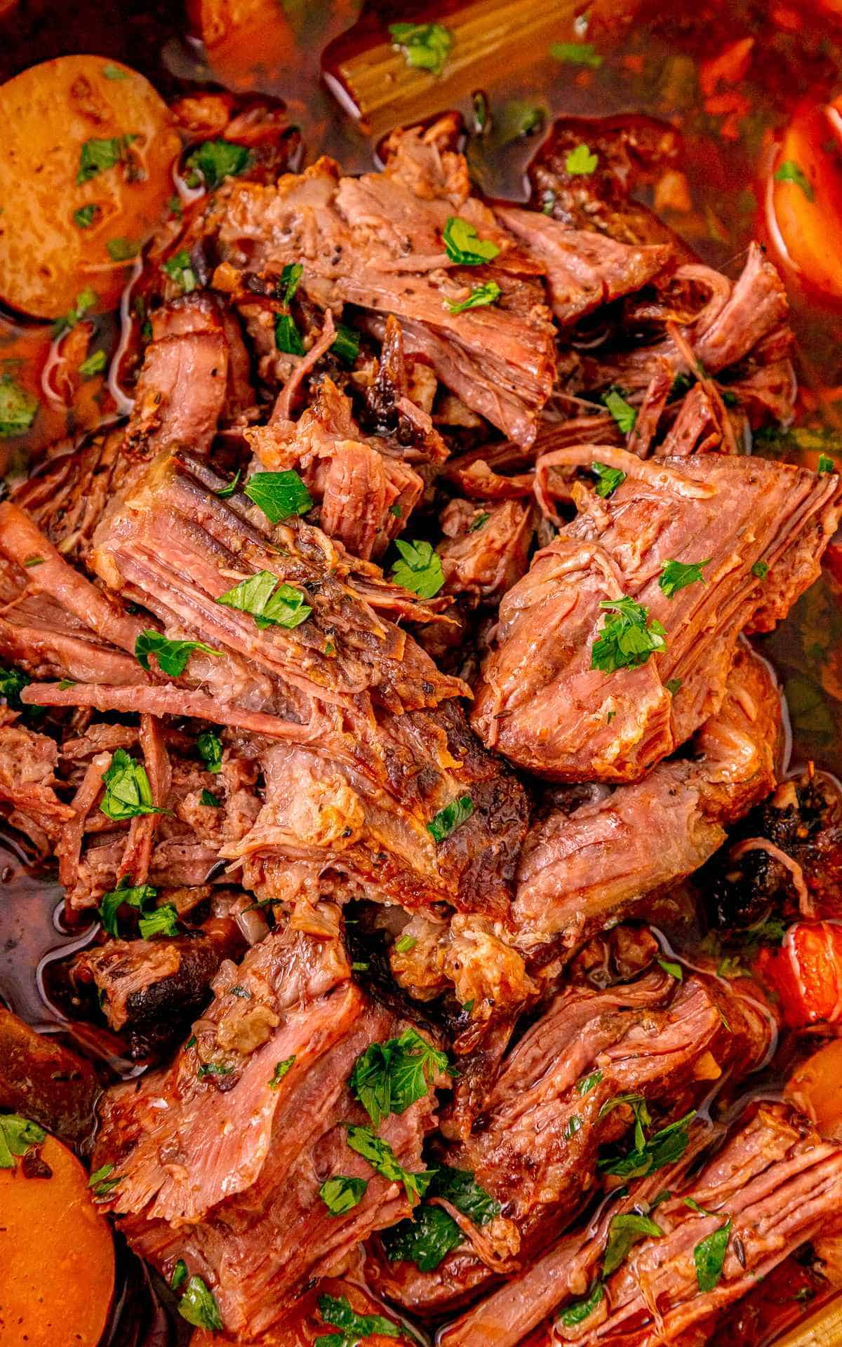 Shredded pot roast with vegetables.